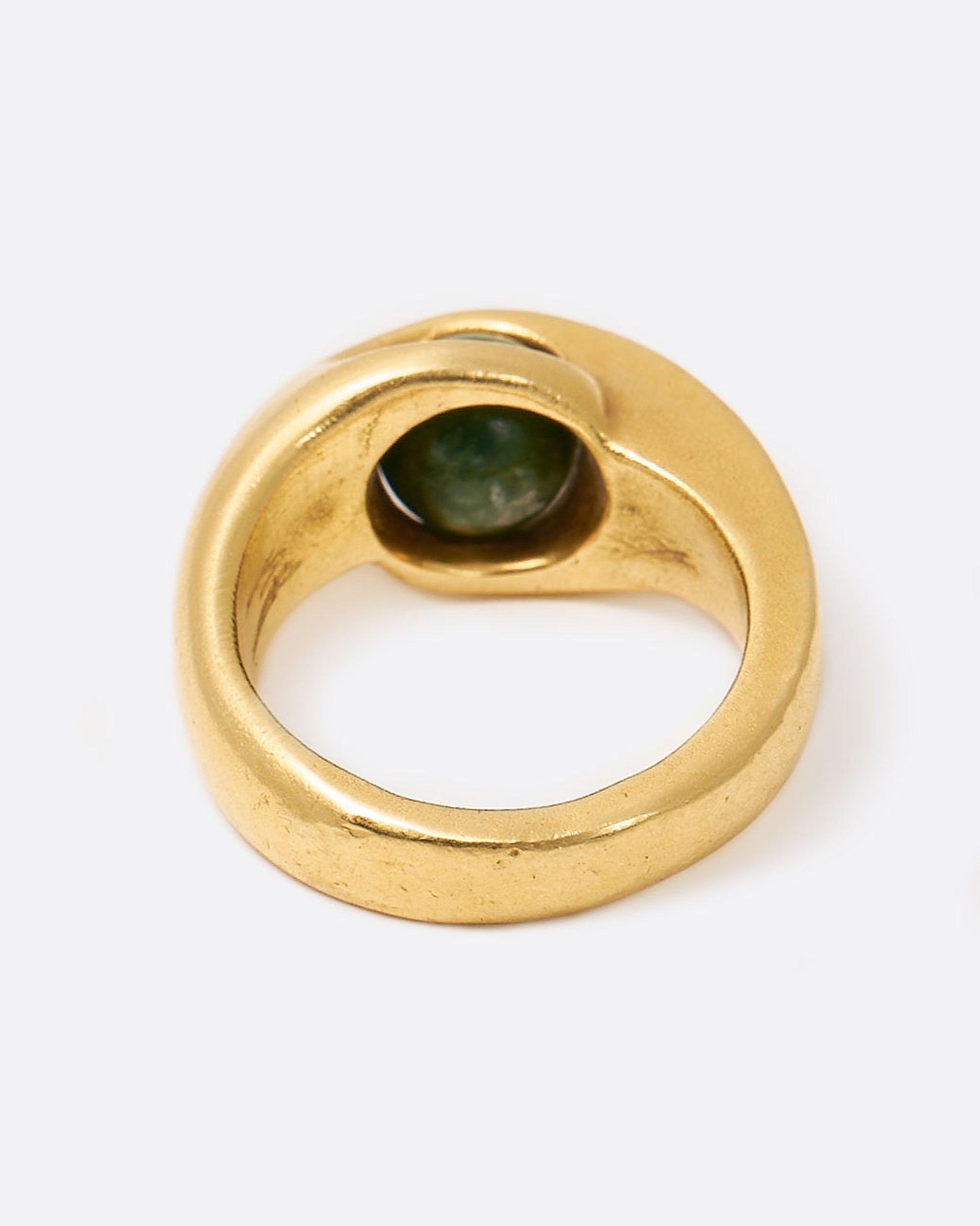 Yellow gold ring with floating green sodalite sphere, shown from the back.