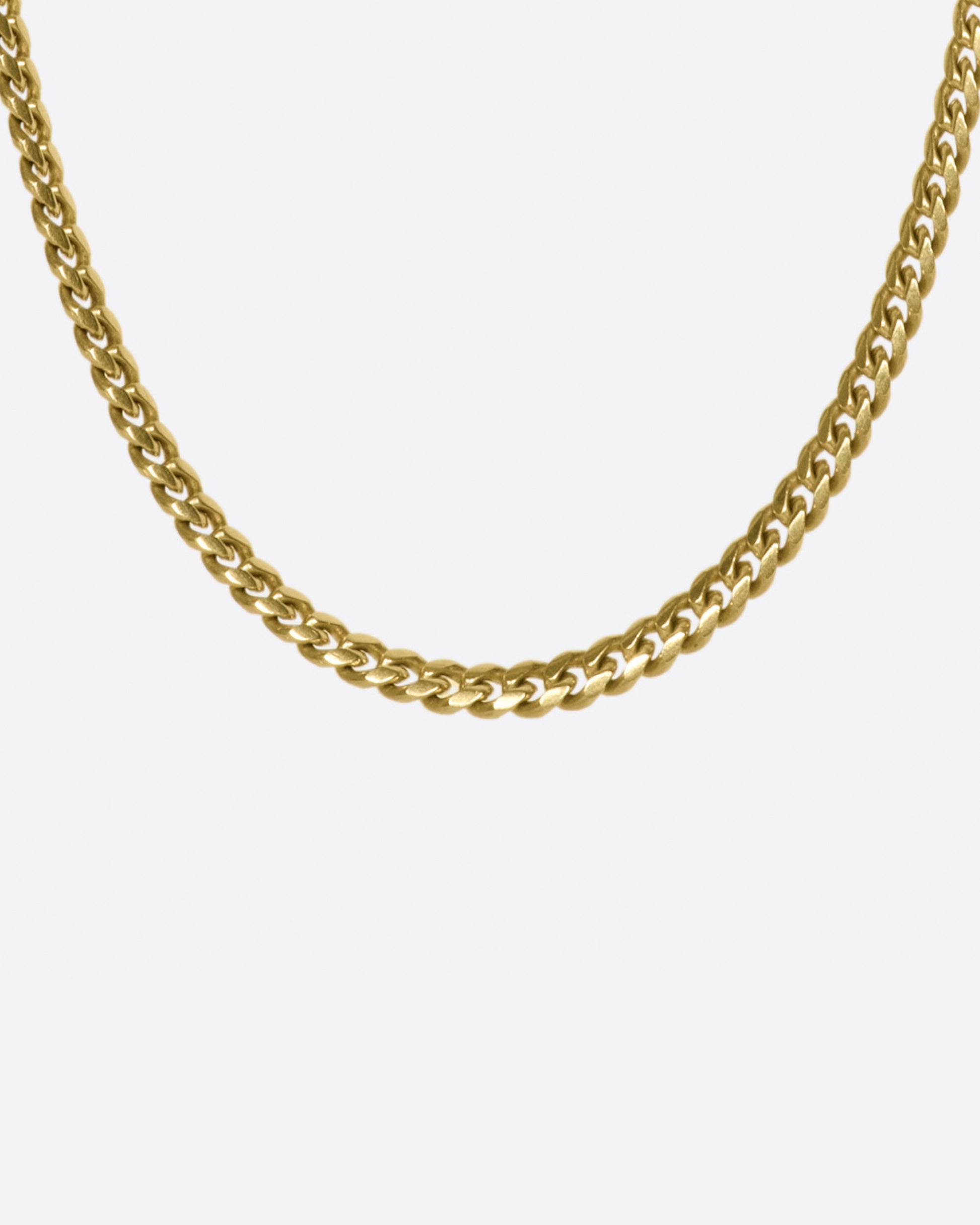 This solid chain is just narrow enough that it's comfortable for everyday wear, but still heavy and substantial.