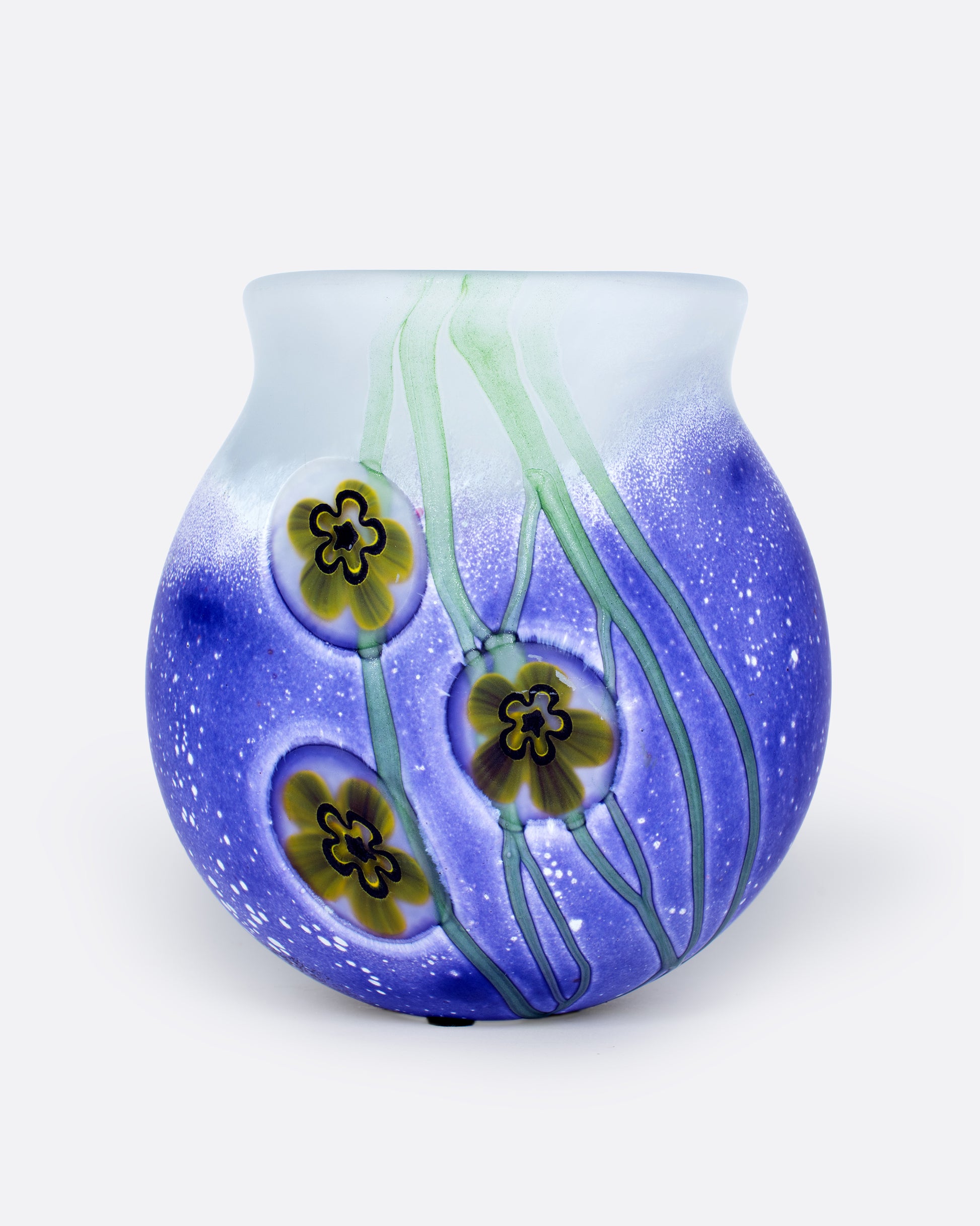 This heavy, frosted glass vase is mesmerizing from every angle.