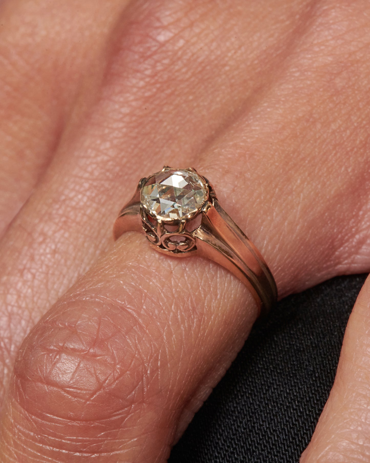 A solitaire diamond ring featuring a one of a kind rose cut diamond.