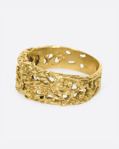 Vintage yellow gold molten textured band, angled view of the textured band