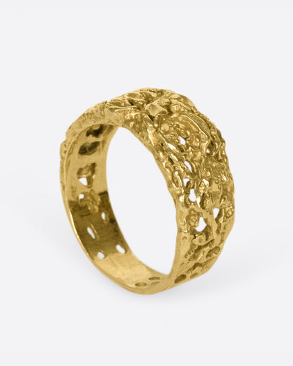 Vintage yellow gold molten textured band, tilted view showing the inside of the band