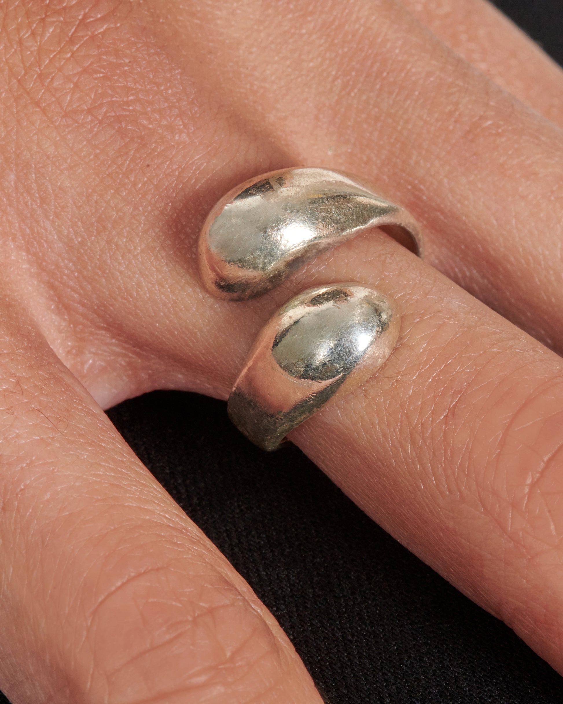 This vintage sterling silver ring wraps your finger comfortably. The smooth, rounded ends make this an easy-going, yet bold addition to your daily lineup.