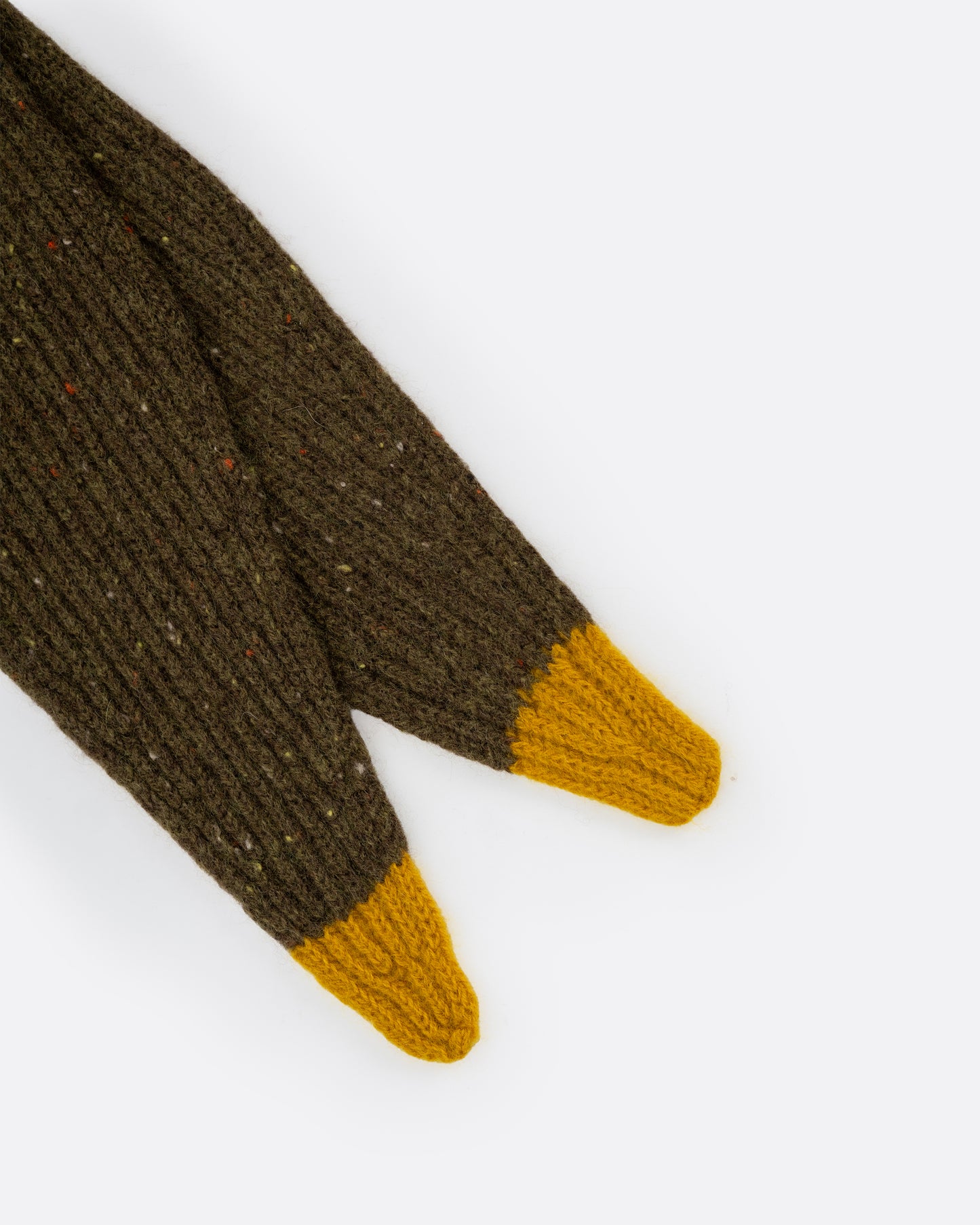 A close up of an olive green cashmere neck scarf with contrasting yellow points.