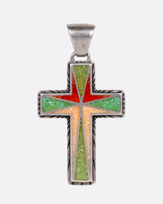 A silver cross with colorful inlay, shown from the front.