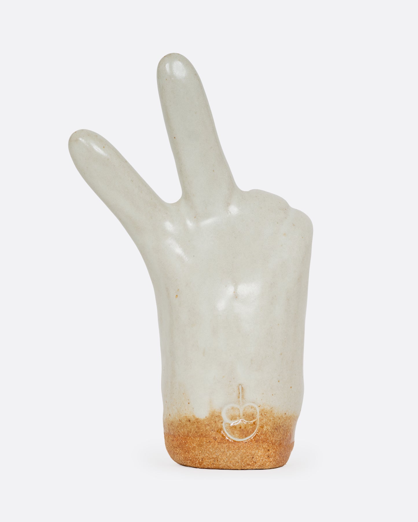 A stoneware white hand making the peace sign glazed in speckled white. Shown from the back.