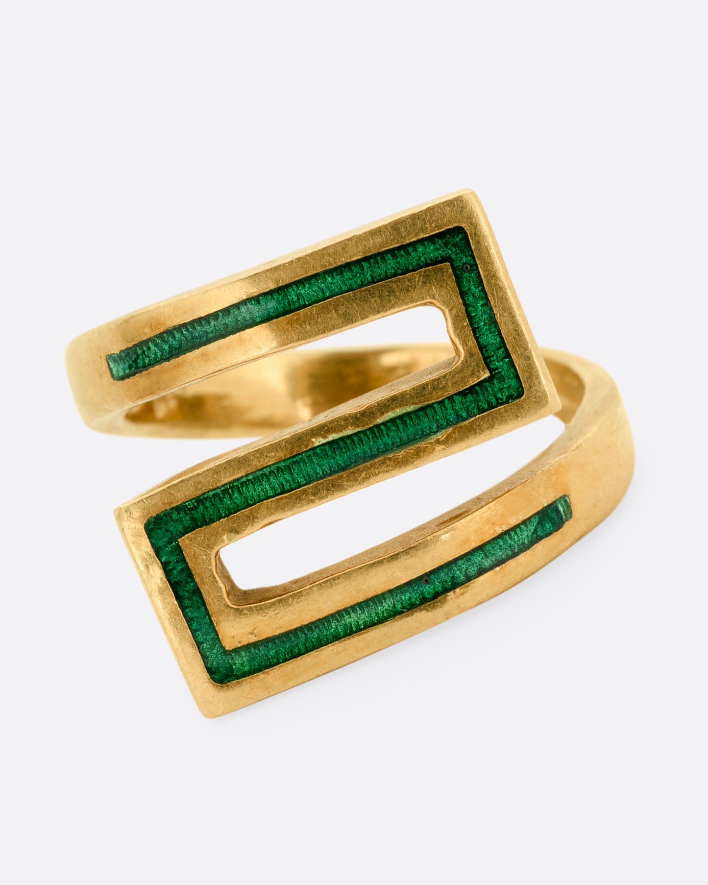 A yellow gold Greek Key ring with a zigzag pattern in green enamel, shown from the front.