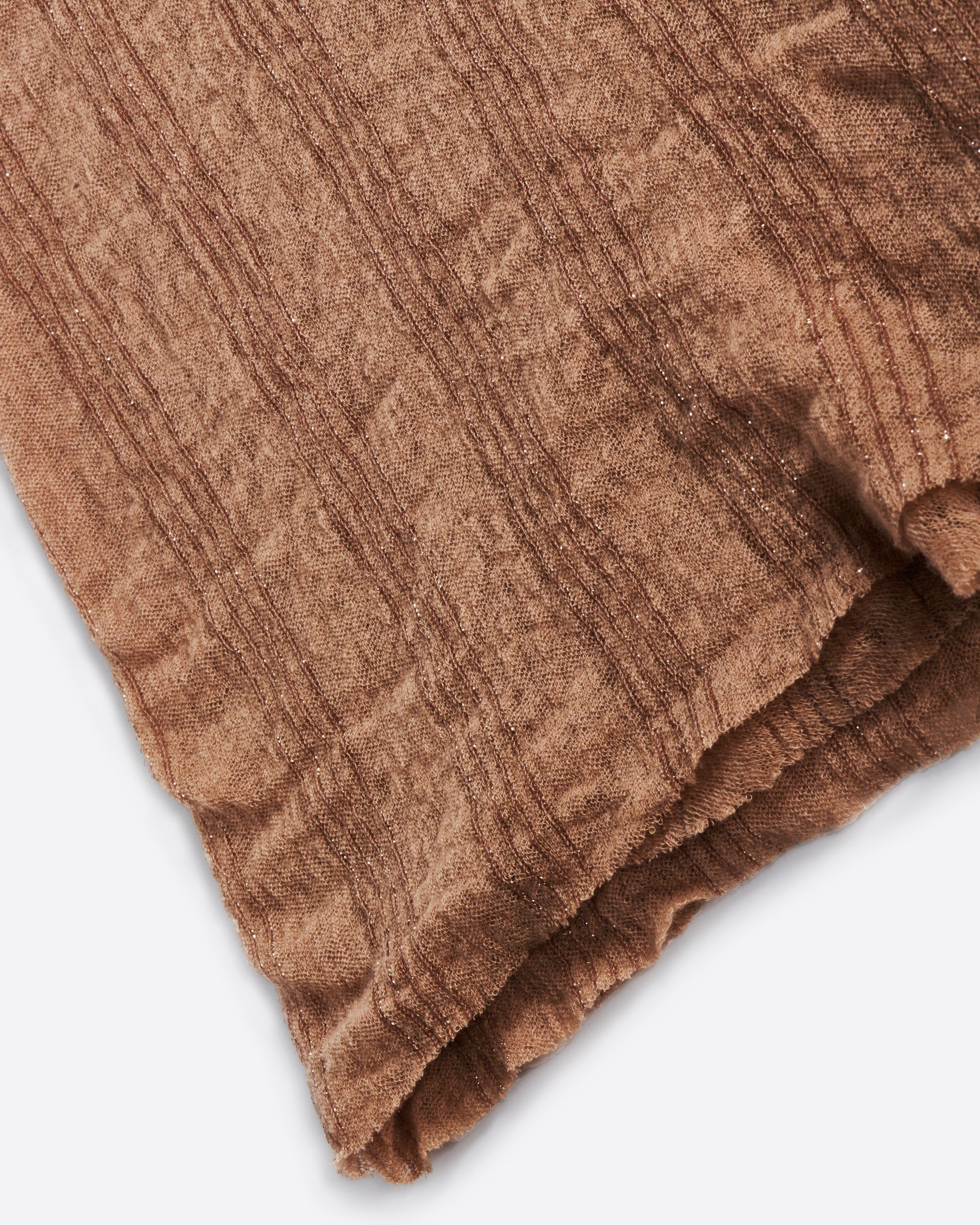 A cashmere, mocha-colored scarf with sparkly lurex stripes.