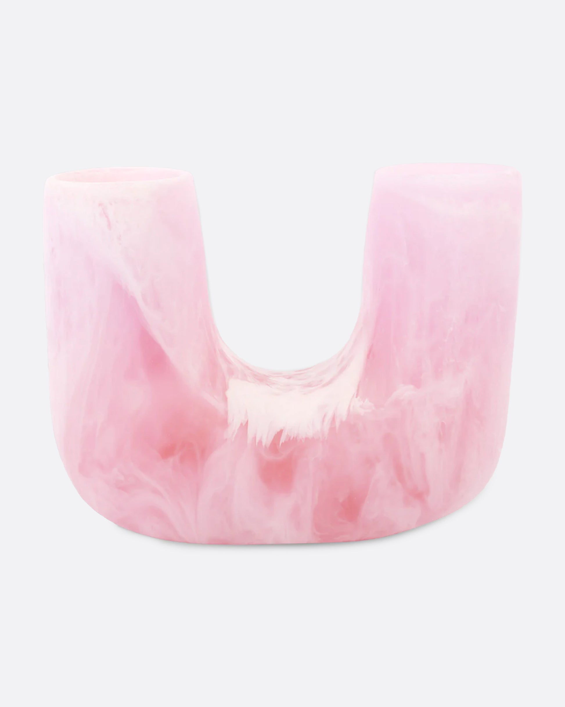 A swirled pink resin U-shaped vase with an opening on either side, shown from the front.