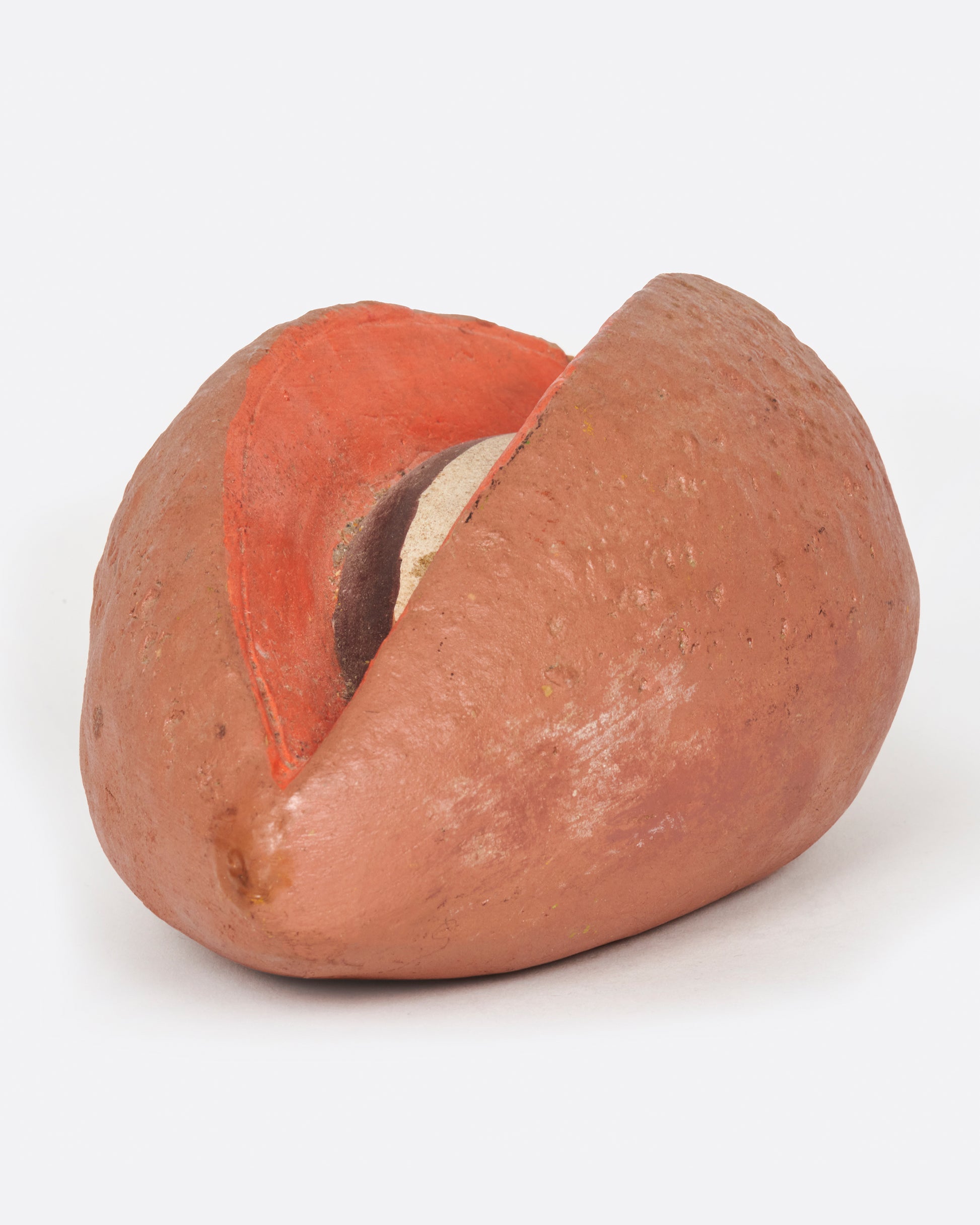 A vintage handmade mamey bank from 1940's Mexico.