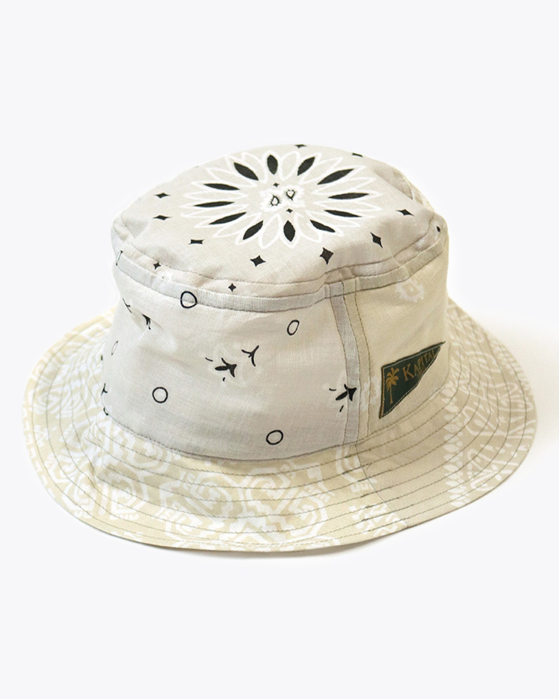 A colorful bucket hat made from vintage bandana patchwork fabric.