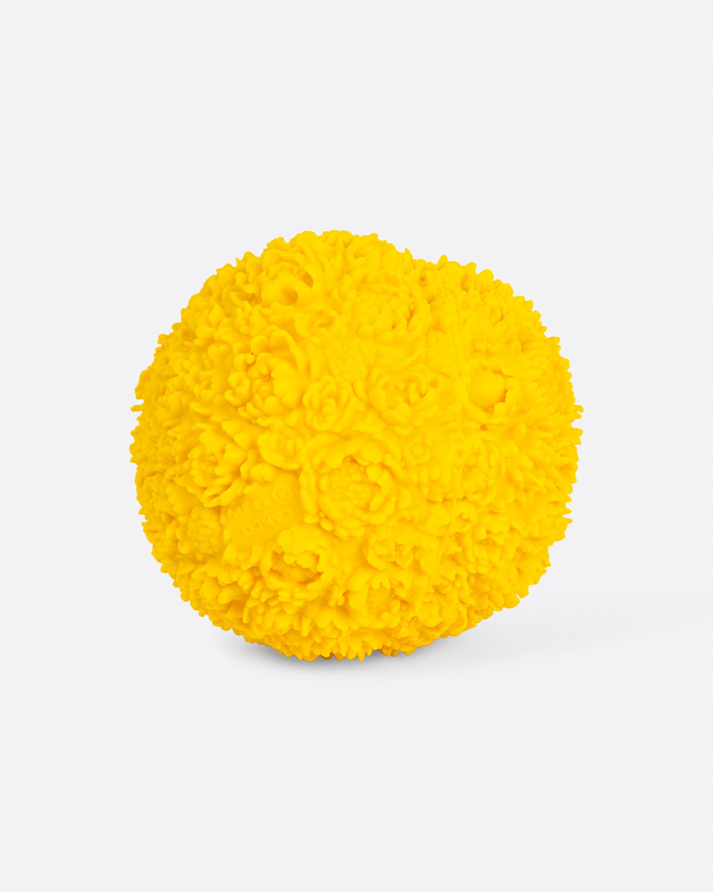 Side view of yellow flower ball dog toy