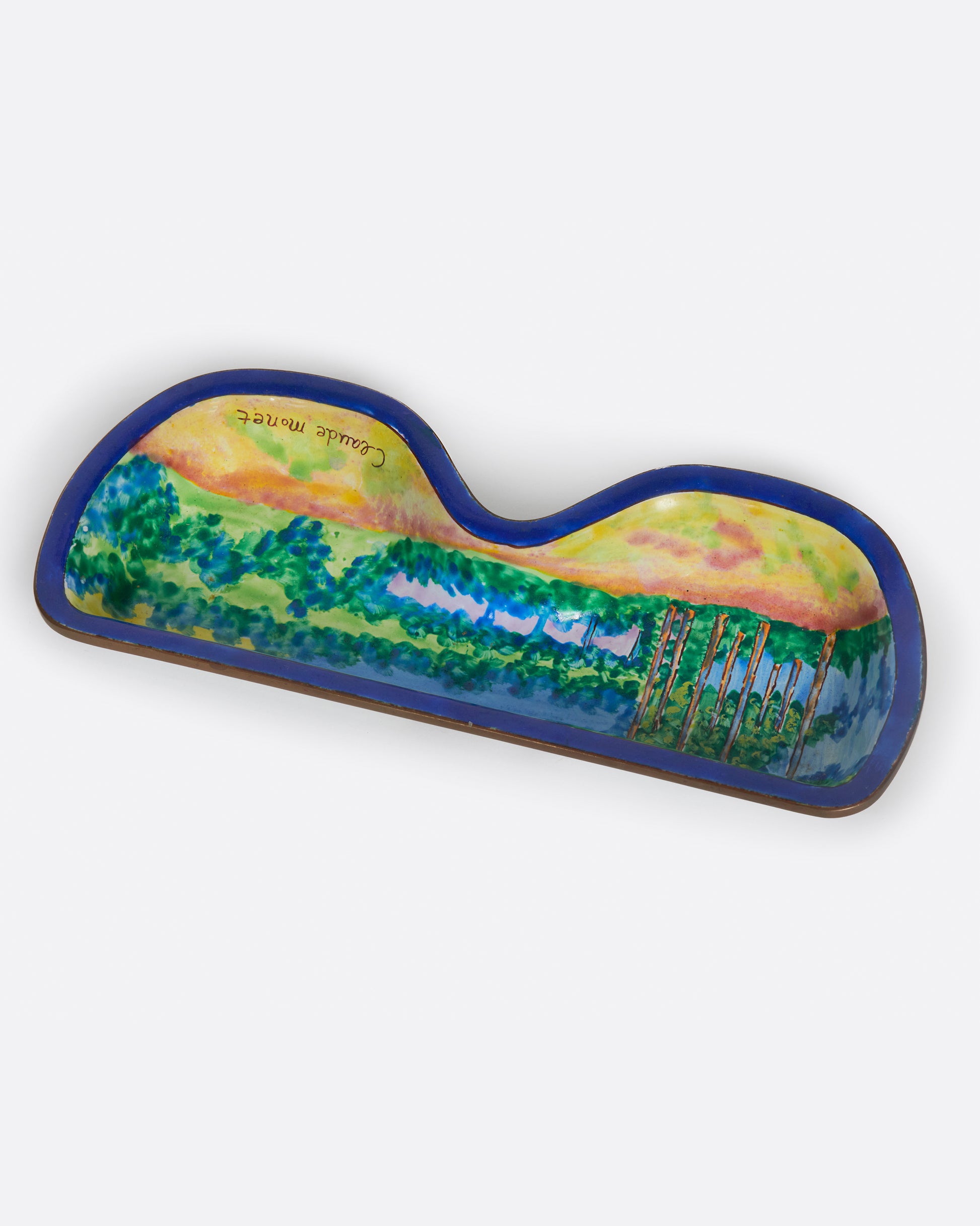 A hand painted copper and enamel tray with a scene from Claude Monet's France, meant to house your glasses.