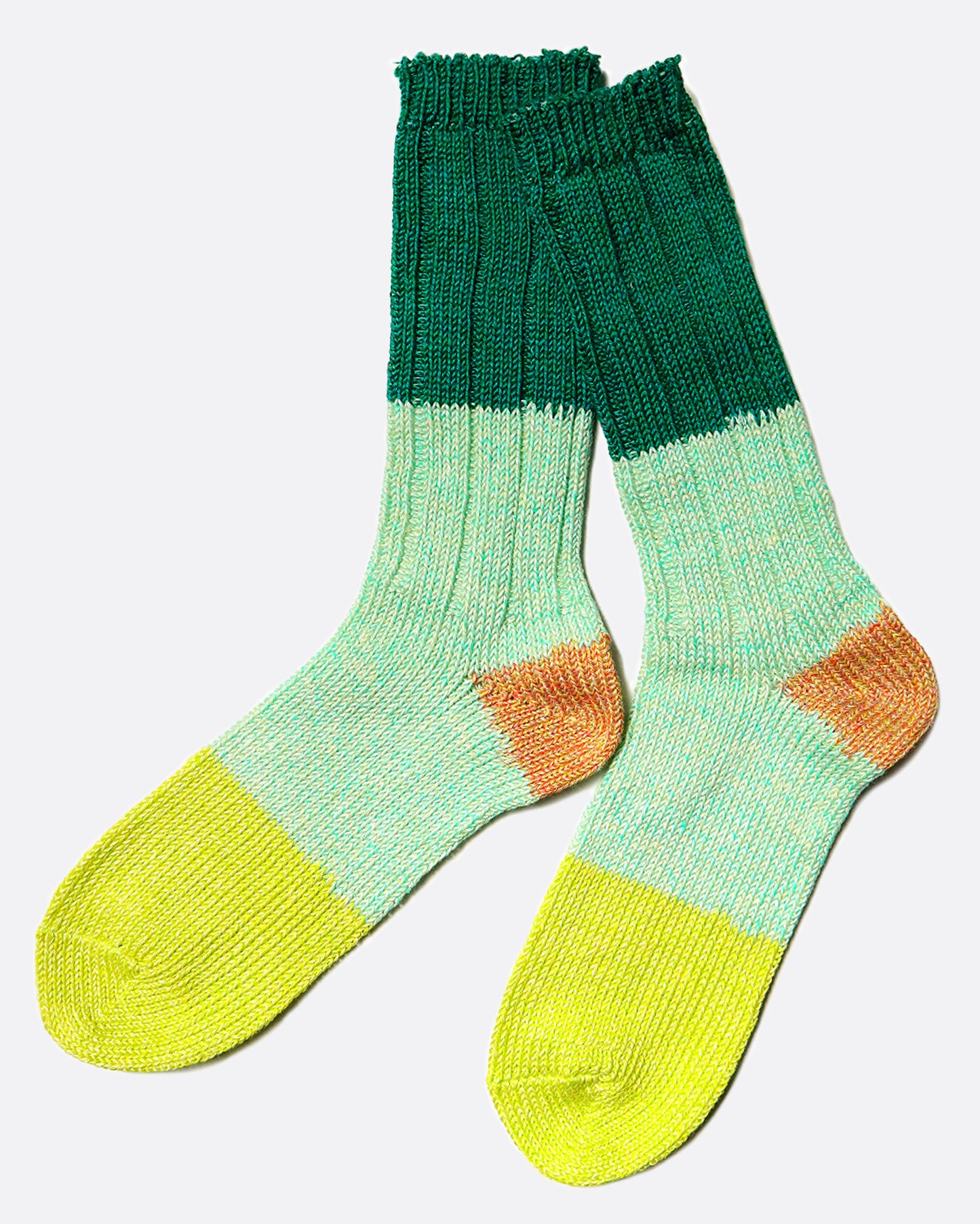 Color blocked linen tube socks in a mix of greens and orange.