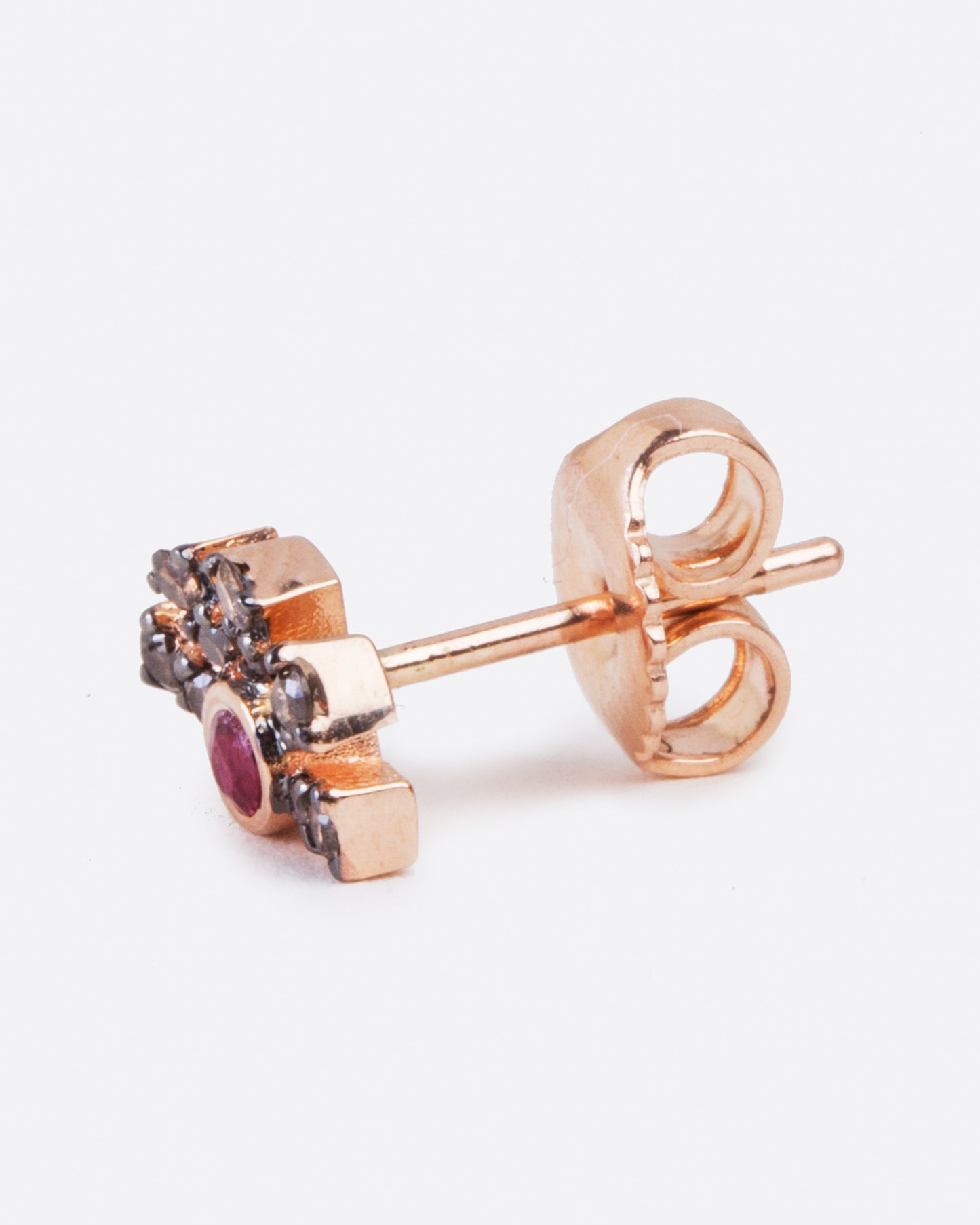rose gold single earring with butterfly backing on post.