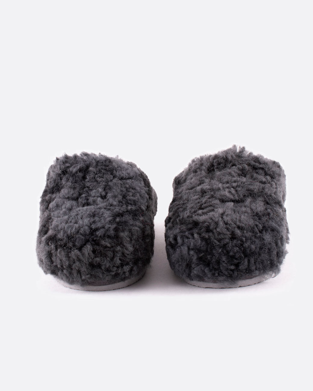 Jenny sheepskin slippers in charcoal gray, shown from the front