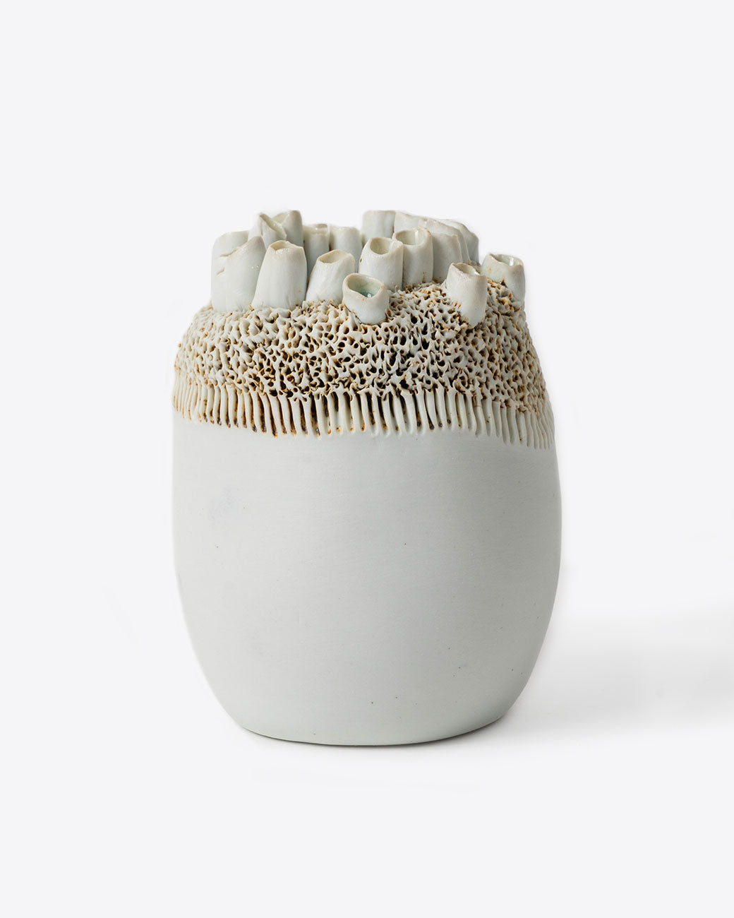 Handmade porcelain barnacle motif vase by Jo Boyer.