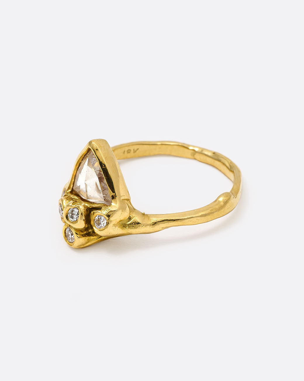 18k yellow gold anemone ring with triangular rose cut diamond and five round diamonds by Kimberlin Brown, shown from the side.