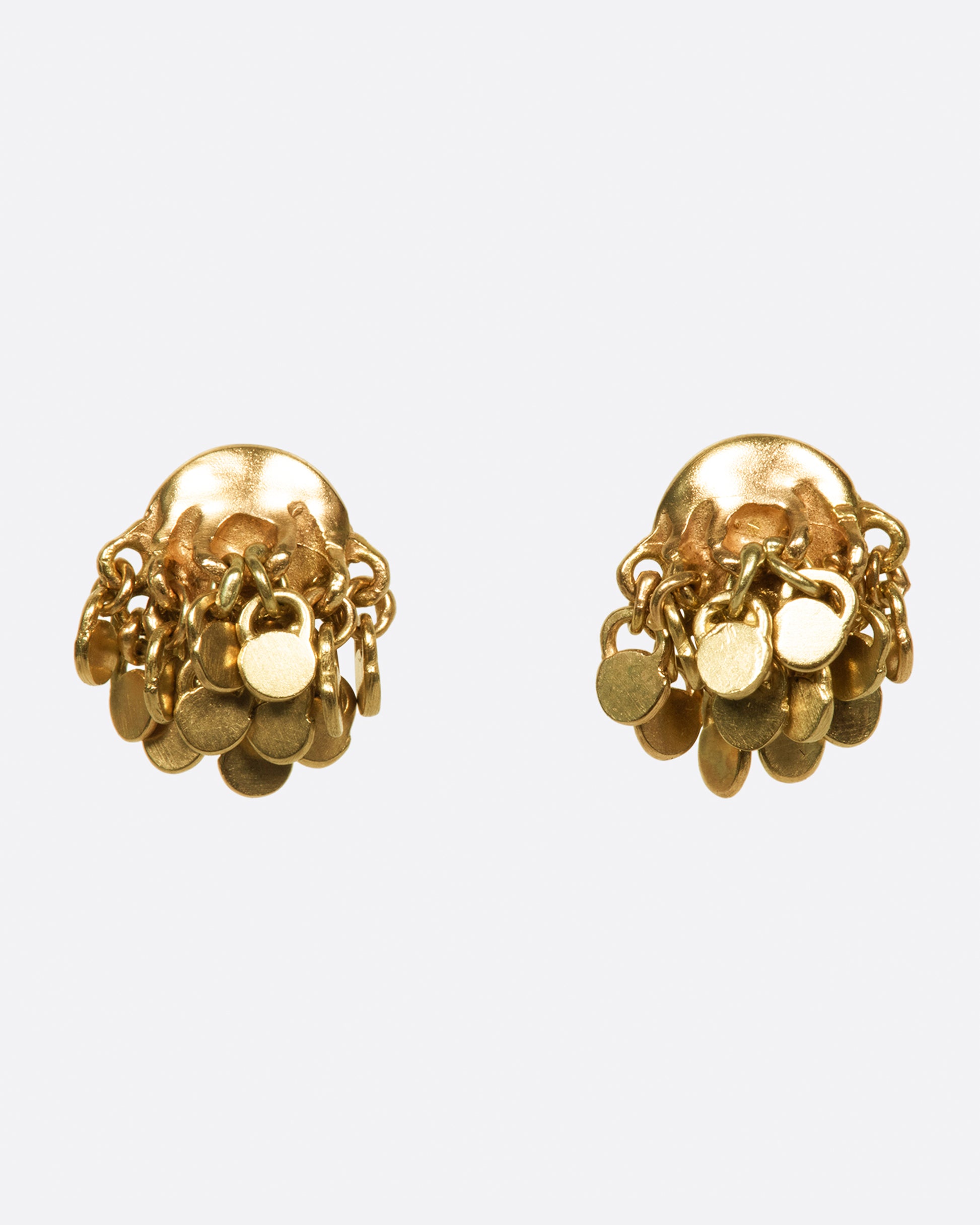 A pair of gold disc stude arrings adorned with sequin dangles, shown from the front.