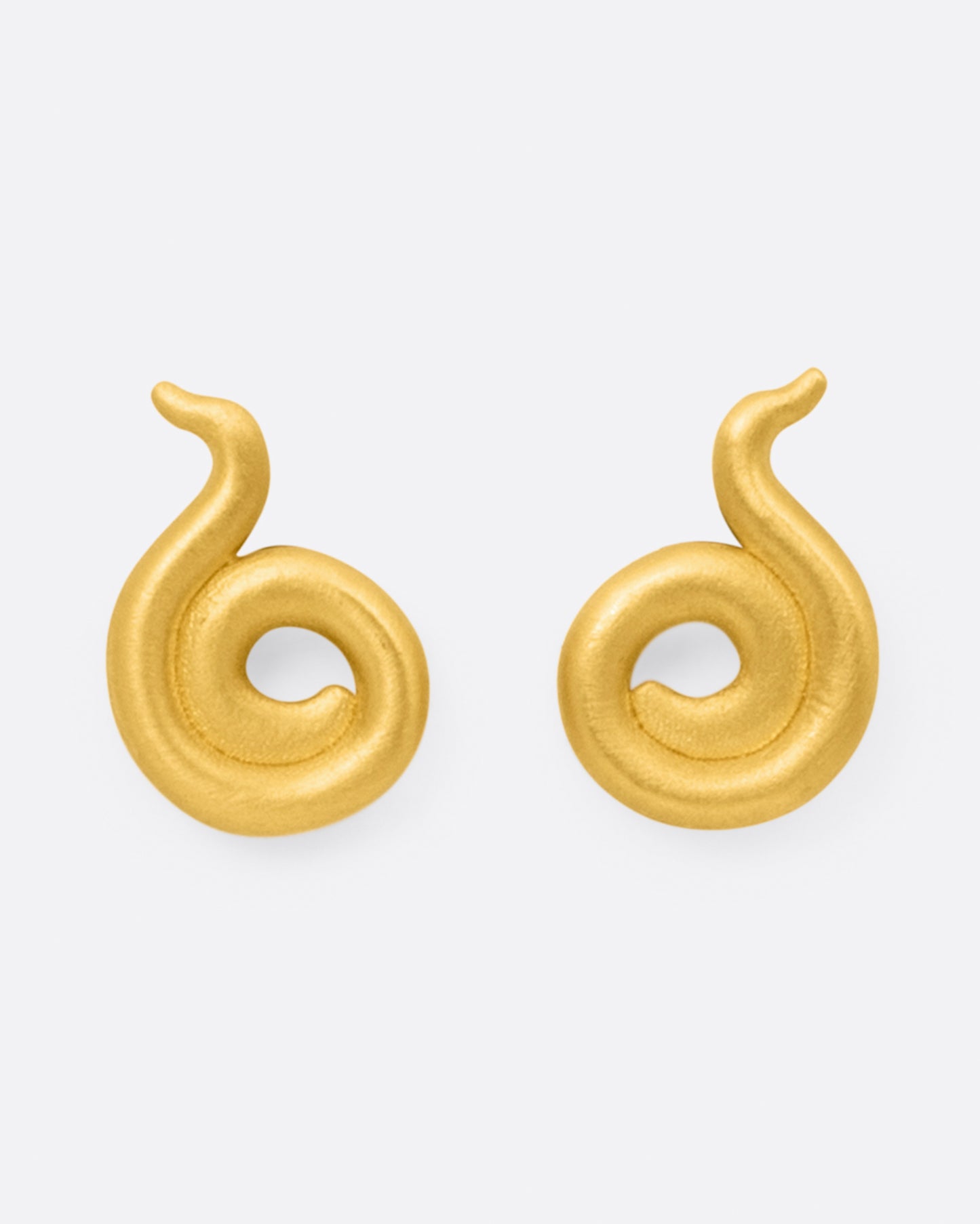 A pair of coiled 22k yellow gold stud earrings, shown from the front.