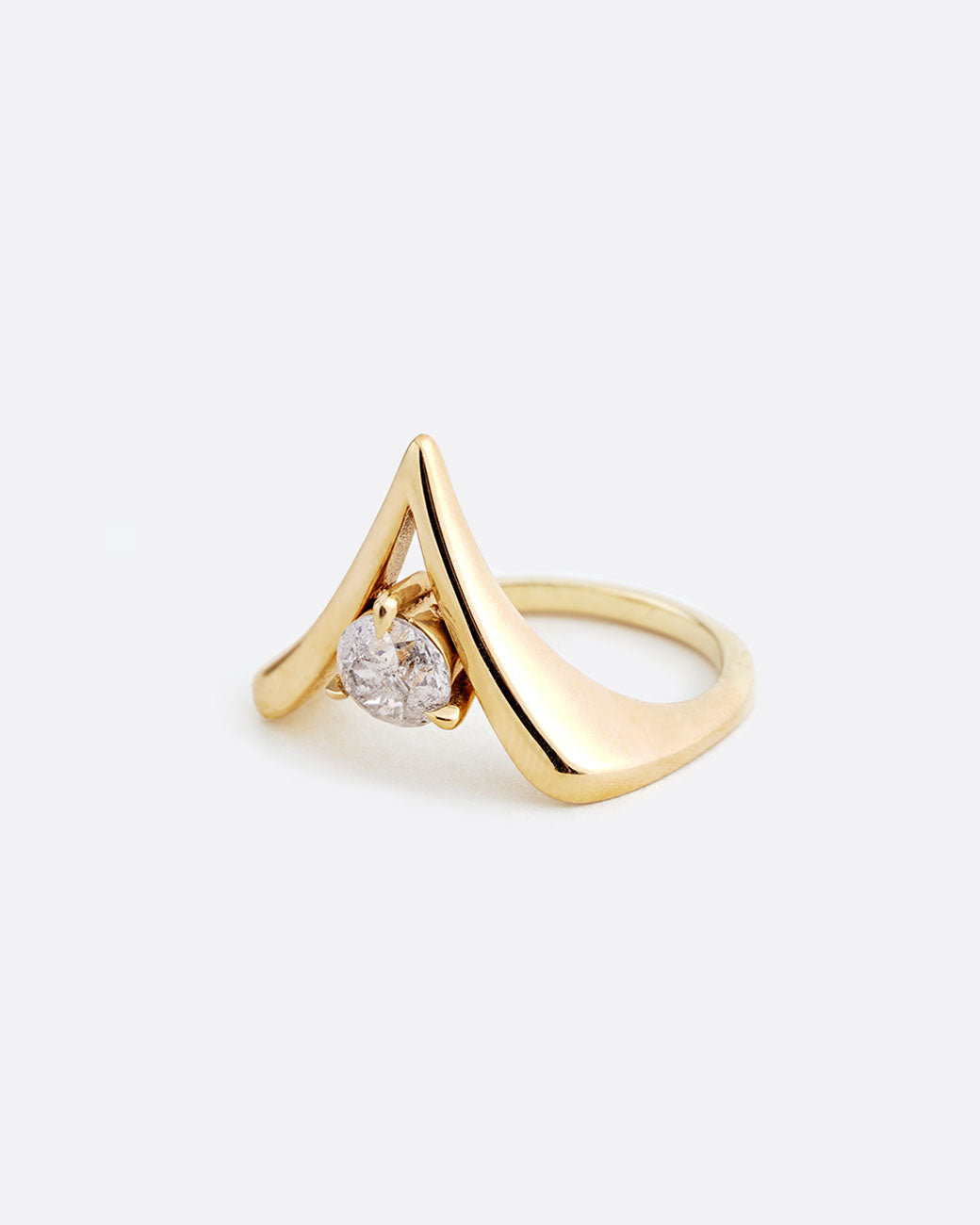14k yellow gold V shaped ring with round diamond by Maggi Simpkins, shown from the side.