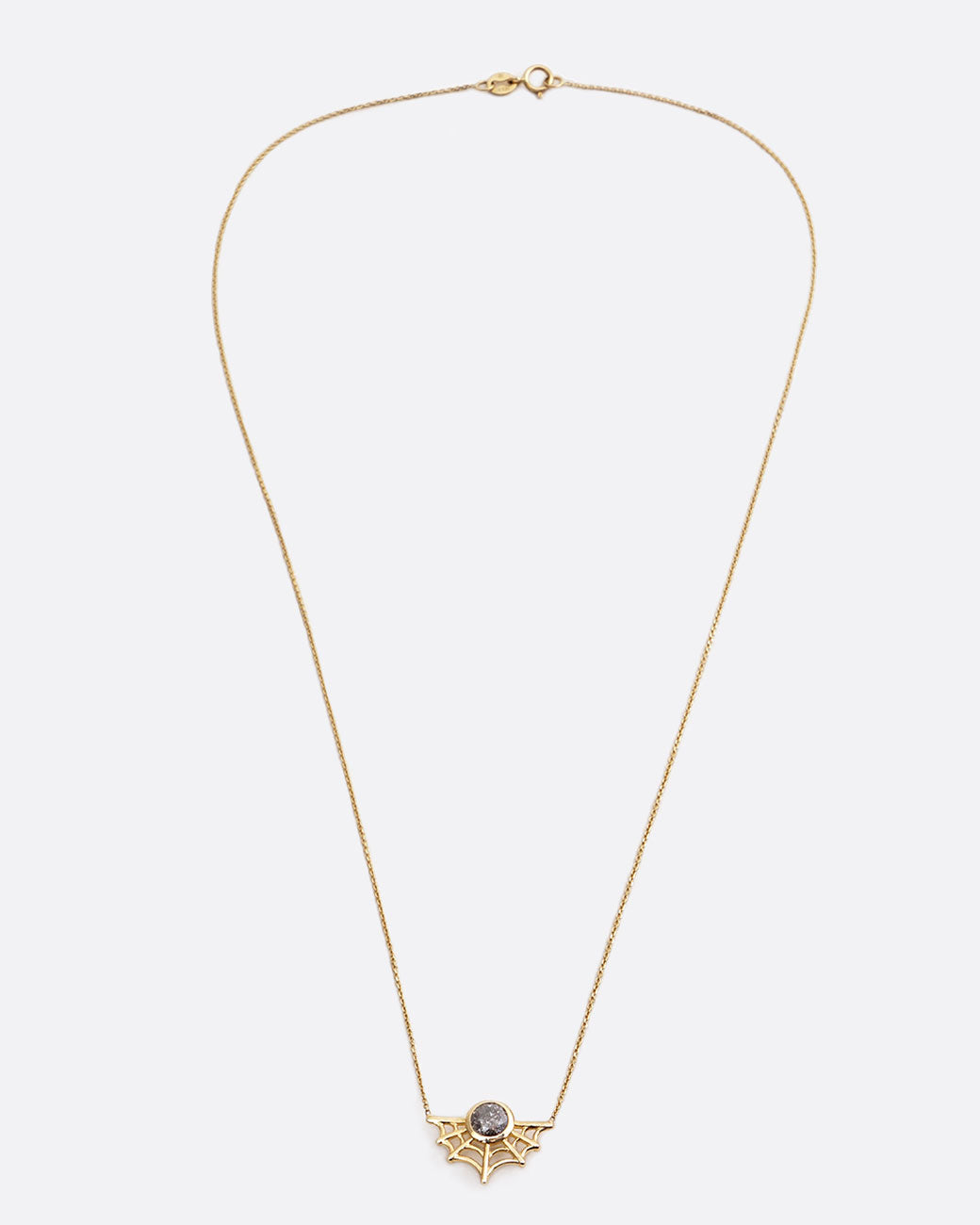 14k yellow gold spider web necklace with round salt and pepper diamond by Margaret Cross.