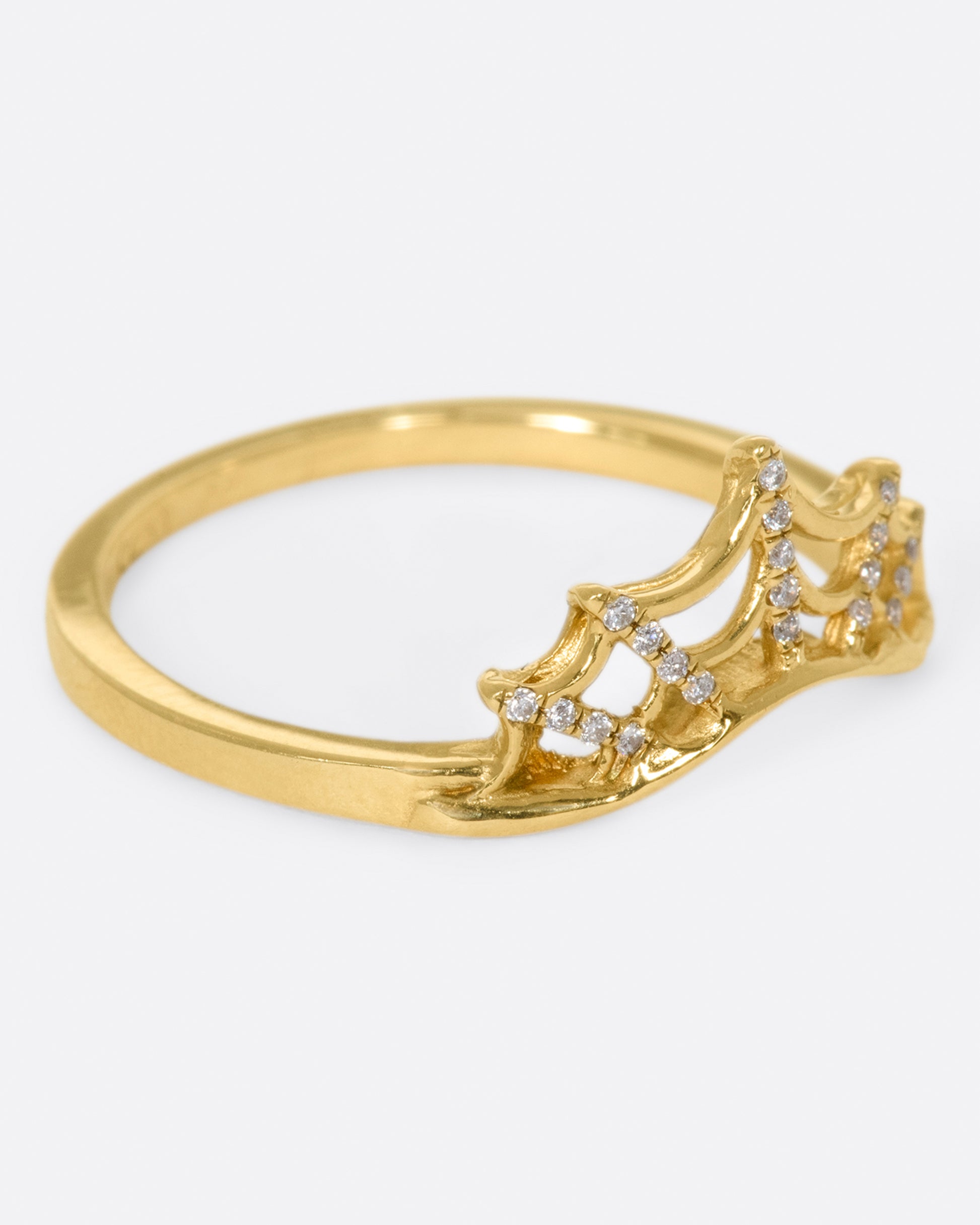 yellow gold ring with curved spider web with pave diamonds by Margaret Cross