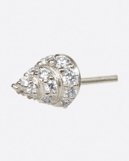 A white gold conical stud earring, with diamond accents, shown from the side.