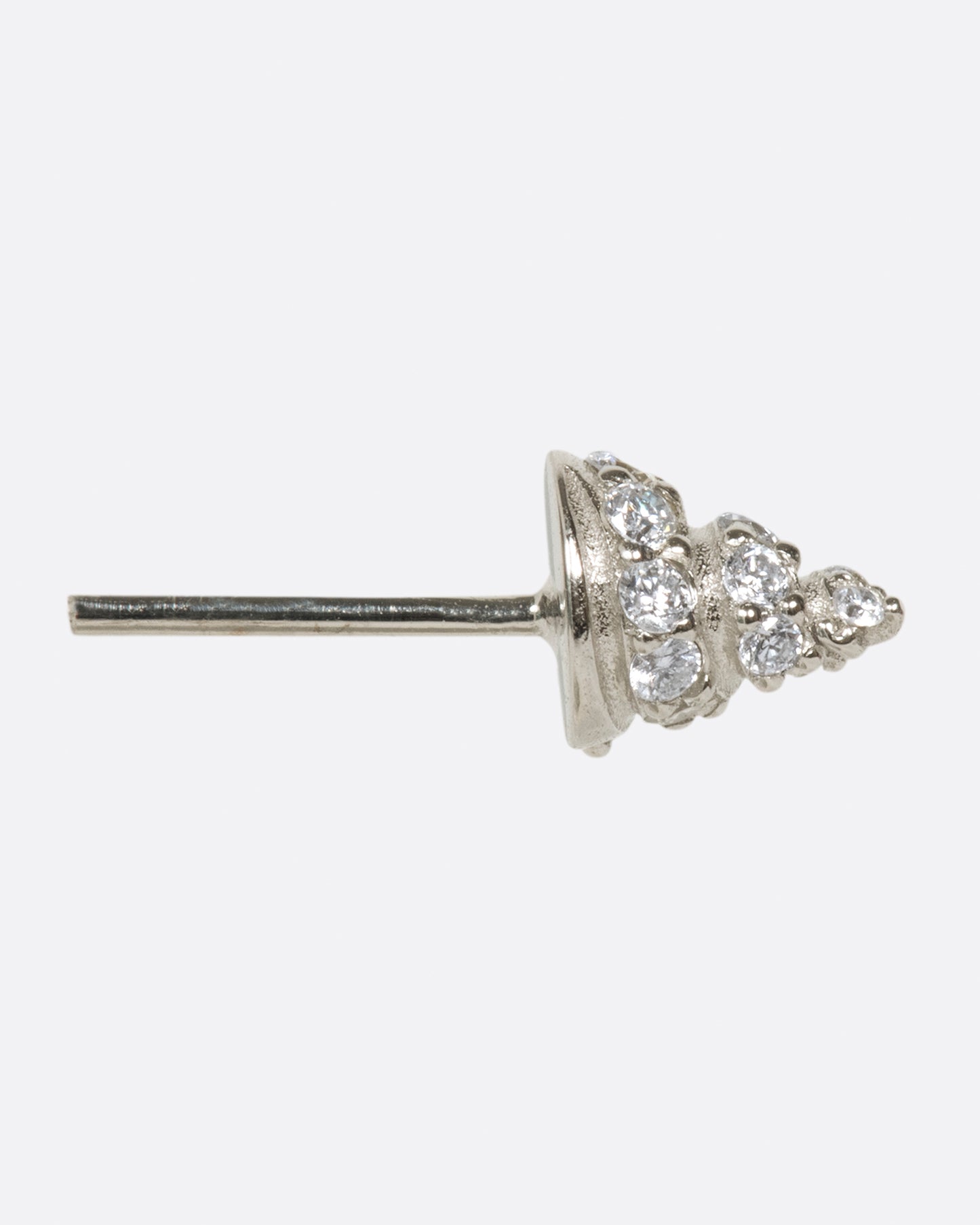 A pointed stud, in your choice of gold, with diamonds wrapped around it.