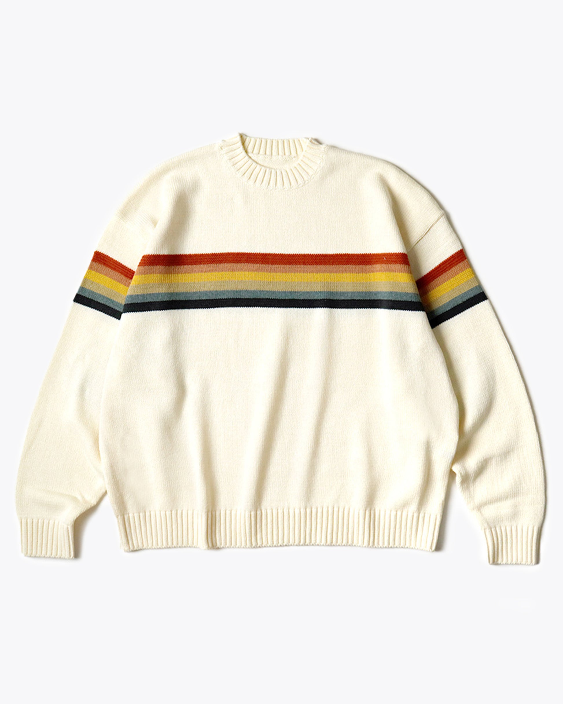 A 5g knit crewneck sweater with a rainbow stripe and smiley elbow patches