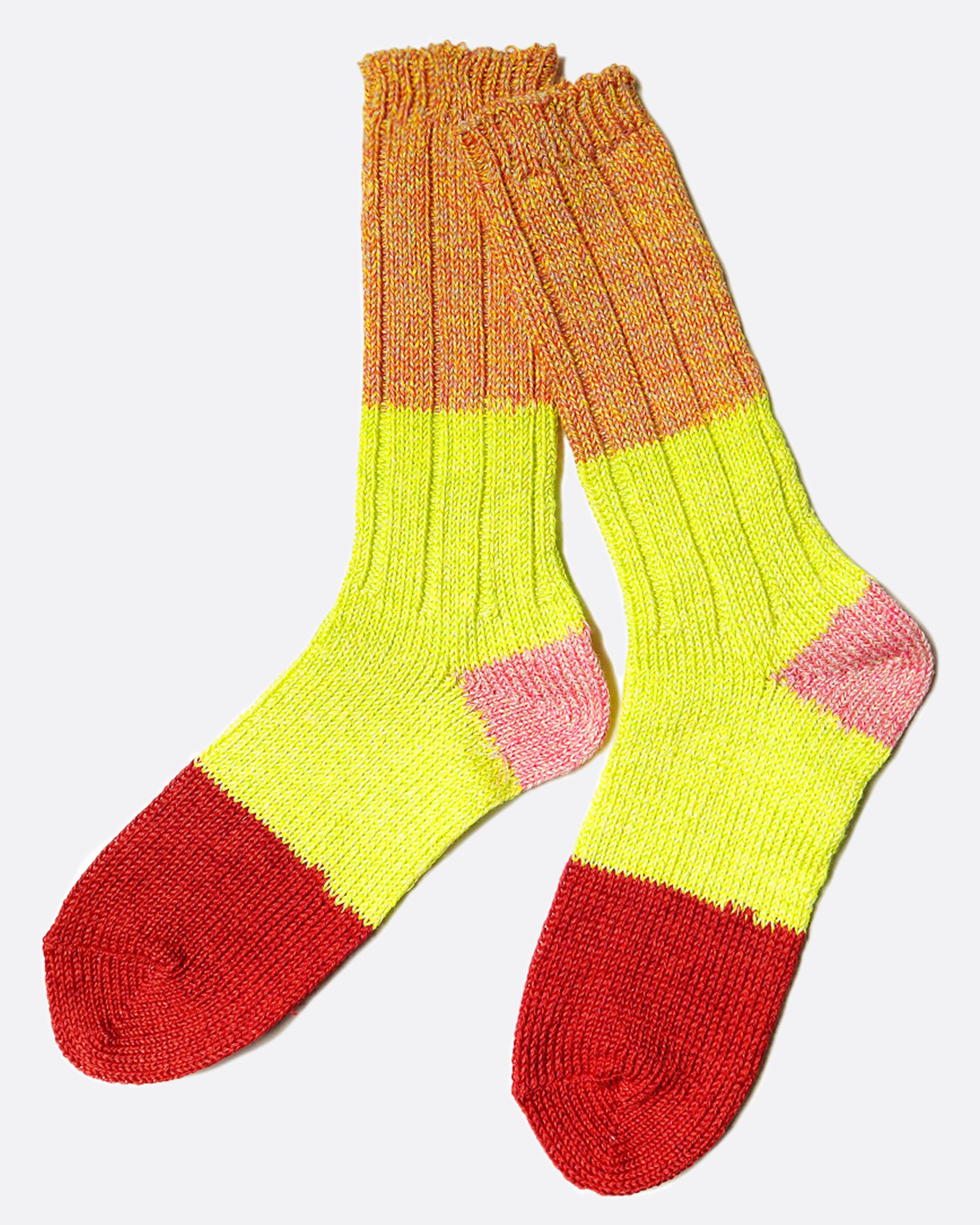 Color blocked linen tube socks in a mix of red, yellow, pink and orange.