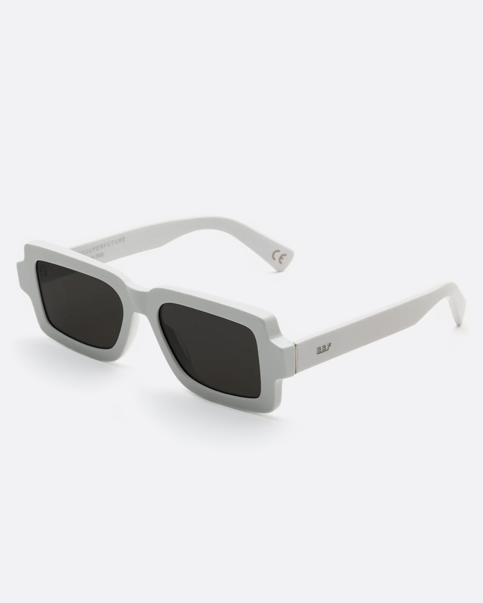 A sharp, contemporary silhouette in solid white acetate.