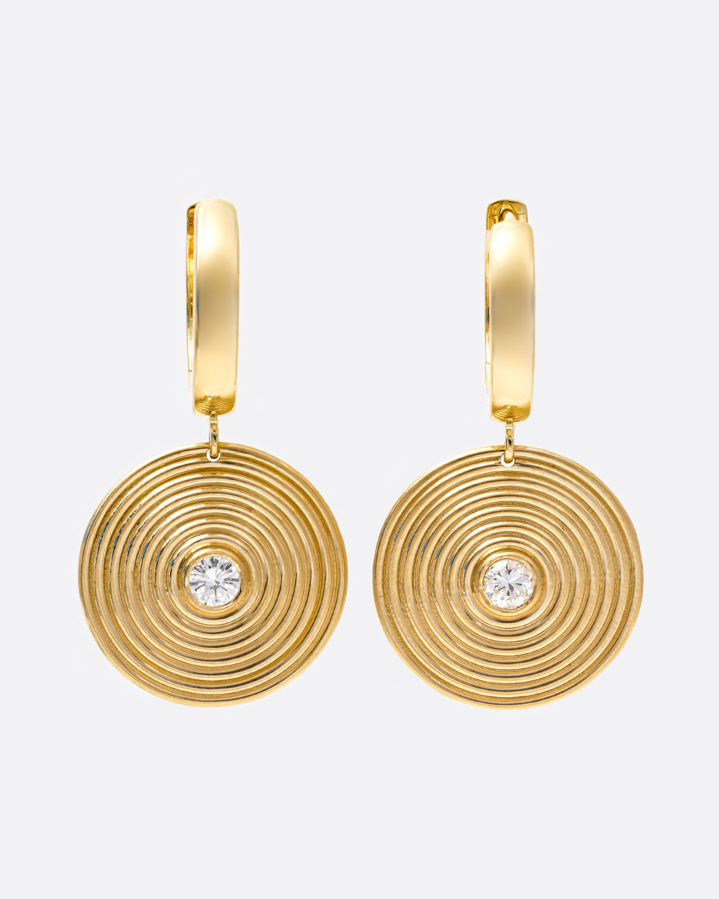 14k yellow gold hoop earrings with round ribbed diamond drops by Selin Kent, shown from the front.