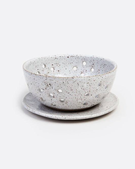 Small white stoneware berry bowl.