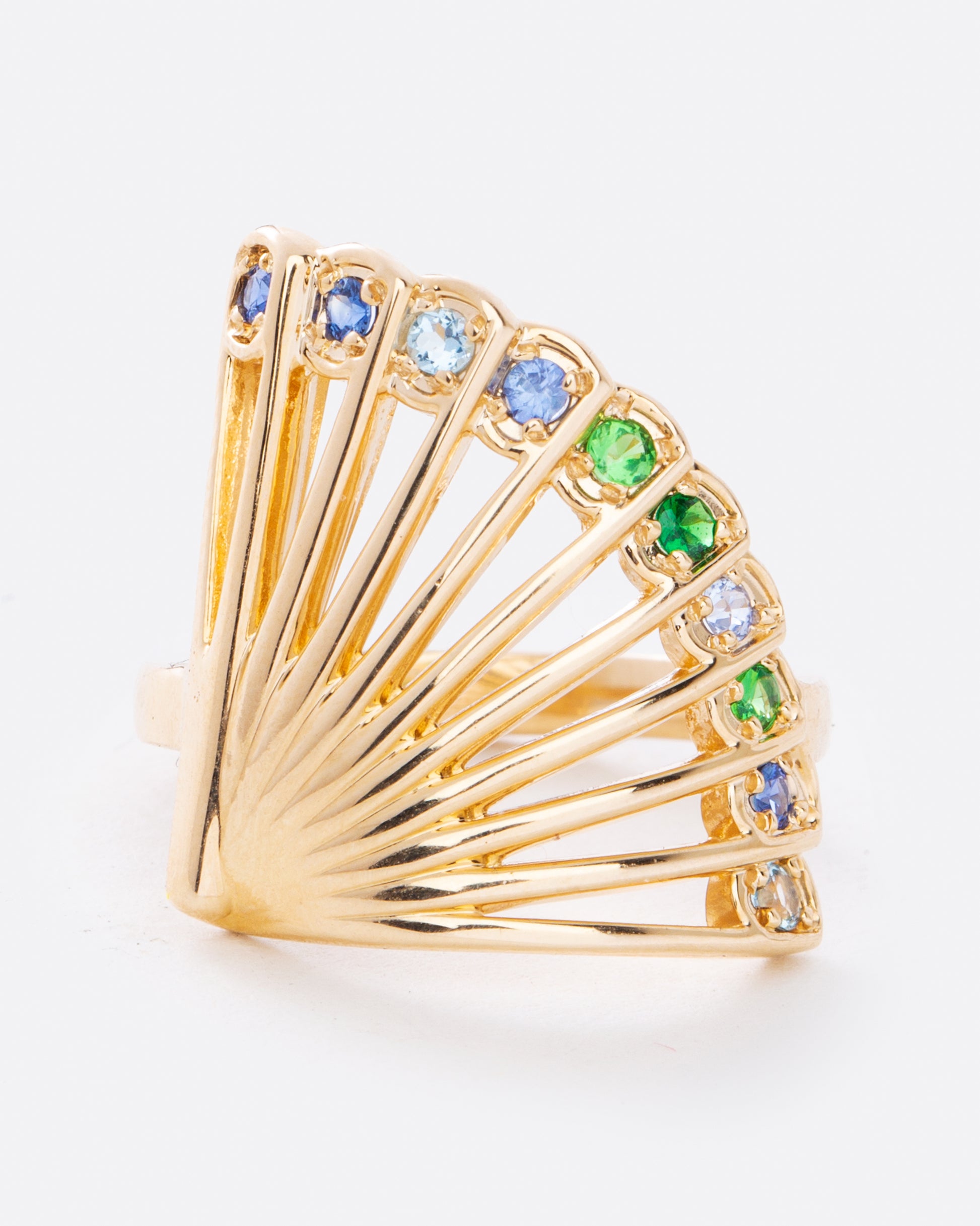 fan shaped ring with large multicolor sapphires along the edge